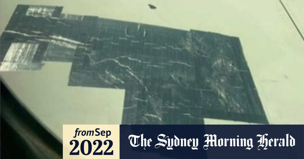 Video Passenger concerned after spotting tape on wing of plane